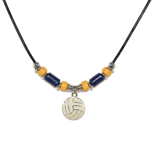 white volleyball pendant necklace with navy blue and yellow beads on a black leather cord