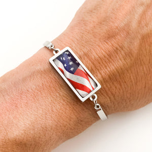 close up of stainless steel patriotic USA flag bar bracelet