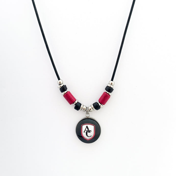custom stainless steel Archbishop Curley pendant necklace with black leather cord and ceramic greek beads in maroon and black