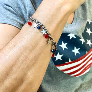 close up of woman wearing a patriotic bracelet with stars and swarovski crystal beads