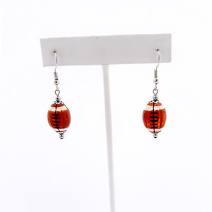 ceramic football bead earrings with stainless steel ear wires