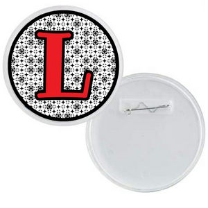 Personalized acrylic photo button with a red initial L and black pattern background