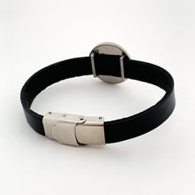 back view of black leather strap bracelet with closed stainless steel clasp and slide charm