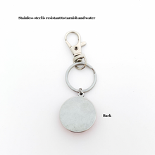 back view of stainless steel round keychain with swivel clip