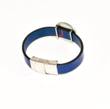 back view of blue leather cuff bracelet with closed stainless steel clasp