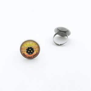 stainless steel adjustable ring with yellow and orange Pickleball Rise and Shine graphic clip art