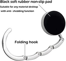 diagram of the back side of a silver purse hook with black rubber non slip pad