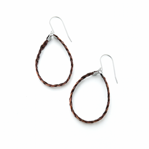 pair of brown braided leather hoop earrings on titanium ear wires