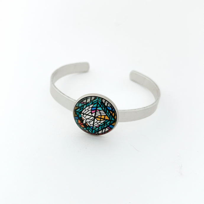 aluminum cuff bracelet with a stained glass dove holy spirit graphic