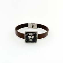 brown leather strap bracelet and square slide charm with image of Jesus