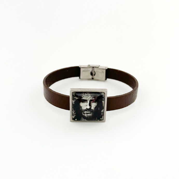 brown leather strap bracelet and square slide charm with image of Jesus