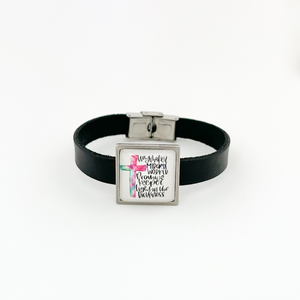 black leather bracelet featuring christian graphic slide charm and stainless steel clasp