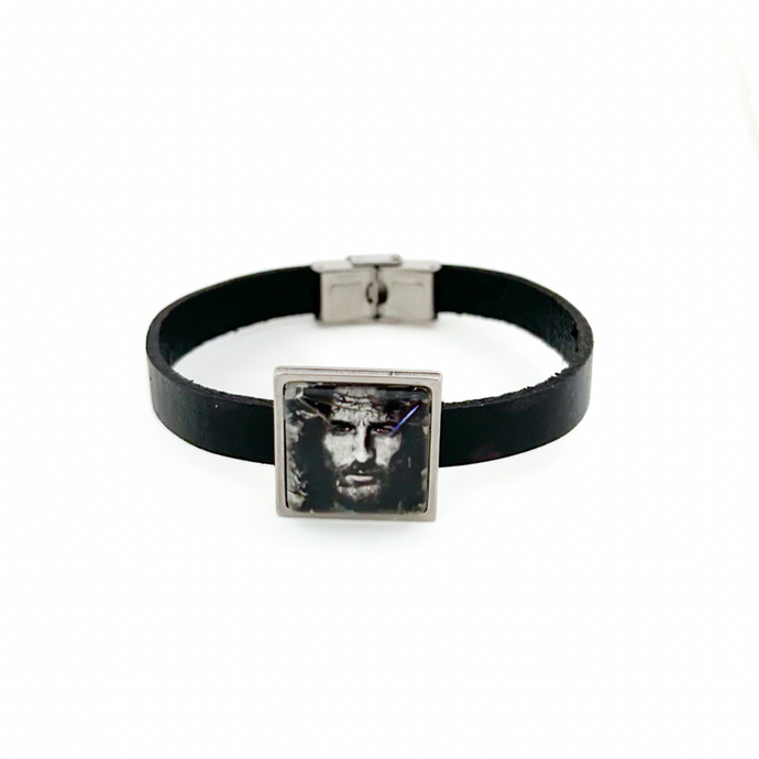 black leather cuff bracelet with Jesus Christ slide charm and stainless steel clasp