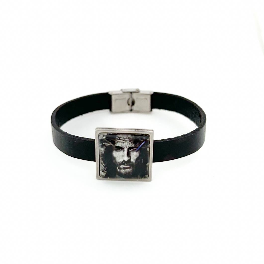 black leather cuff bracelet with Jesus Christ slide charm and stainless steel clasp
