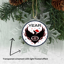 Custom Sonoraville high school acrylic photo ornament on a Christmas tree and pinecone background.