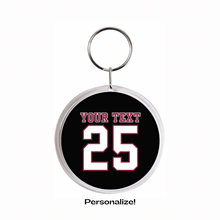 personalized acrylic Round keychain with customizable text and number on a black background