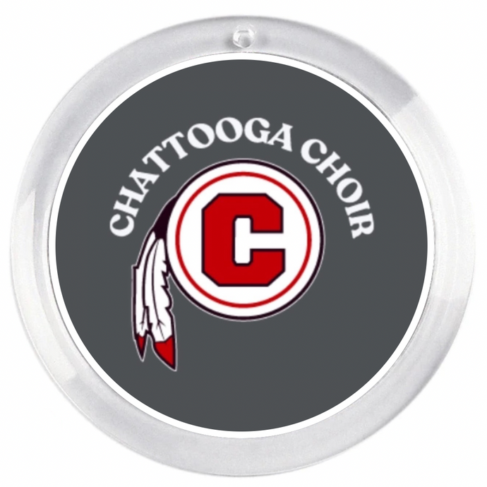 acrylic round disc with the Chattooga Choir logo on a grey background