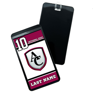 Personalized bag tag with archbishop curly shield logo, the number 10 and the text ‘last name’ in maroon and black ￼