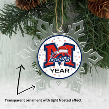 Snowflake-shaped acrylic photo ornament with a holiday themed McKinney Boyd high school logo with snowflakes background in navy blue, red, and white