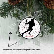 acrylic snowflake shaped ornament with a lacrosse player silhouette and a personalized text for name in the center