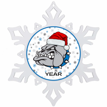 White snowflake-shaped ornament with a holiday themed Belgreen bulldog wearing a Santa hat and 'Year' text in the center