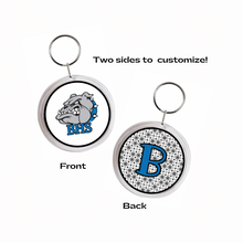 Two-sided keychain with the Belgreen BHS bulldog logo on one side and a blue letter 'B' on a black pattern background