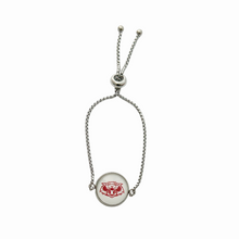 stainless steel adjustable bracelet with a circular center charm featuring the Vines High School wildcat logo
