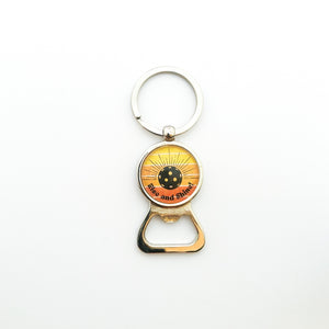 keychain bottle opener with yellow and orange Rise and shine pickleball graphic