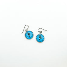 stainless steel charm earrings with a blue "I Dink And I Know Things" pickleball graphic and niobium ear wires