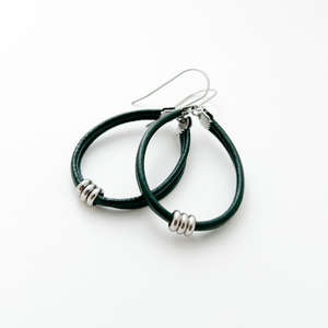 dark hunter green leather hoop earrings with stainless steel accents and titanium ear wires
