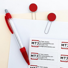 My Team Jewelry address labels with red paper clip bookmarks and pen