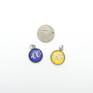 stainless steel CC cross country charms in purple and yellow