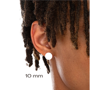 young black male wearing white 10 mm stud earrings