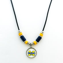 custom McKinney high school lions leather cord necklace with navy and yellow spacer beads