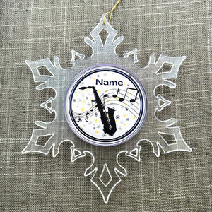 personalized acrylic snowflake ornament with saxophone silhouette and musical notes