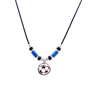 stainless steel soccer pendant necklace with blue and black ceramic tube beads and stainless steel spacers strung on a black leather cord