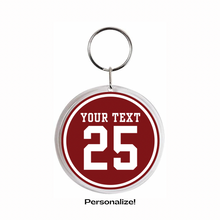 circular acrylic photo keychain personalized with the number 25 and your text in maroon and white
