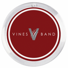 round acrylic photo disc featuring the vines high school band logo in maroon and white