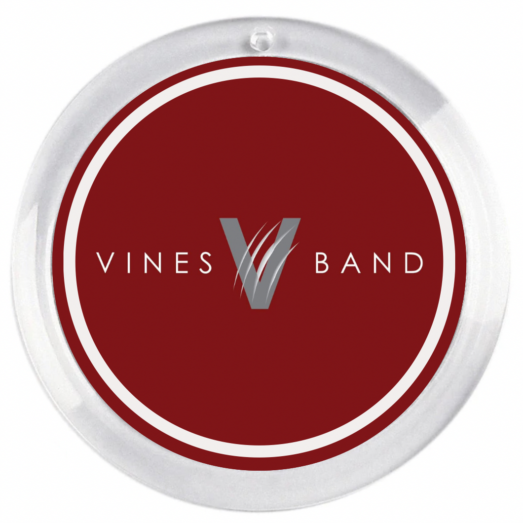 round acrylic photo disc featuring the vines high school band logo in maroon and white