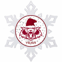 acrylic snowflake shaped ornament with a holiday themed vines high school wildcat graphic in the center