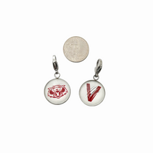set of two stainless steel circular zipper pulls with the vines wildcat and v logos attached to a large lobster clasp