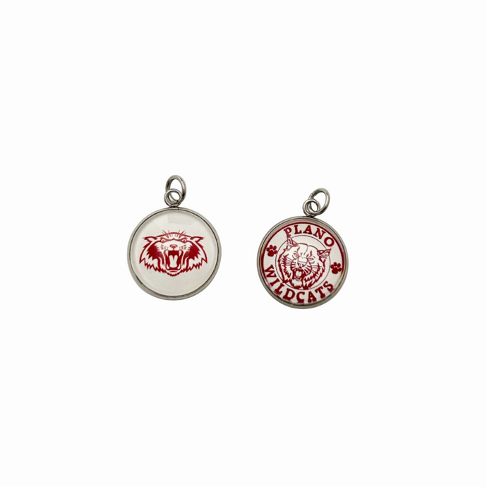 set of two stainless steel circular charms one with the vines wildcat logo and the other with the plano wildcats logo
