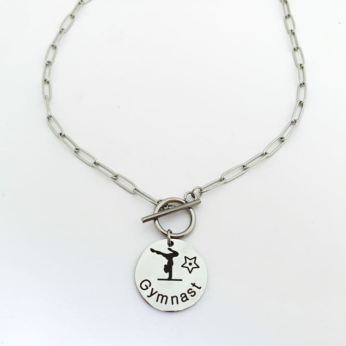 stainless steel gymnast pendant necklace on paperclip chain and toggle clasp