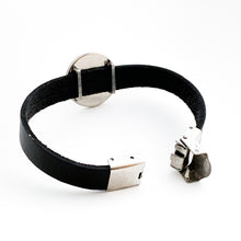 back view of black leather strap bracelet with open stainless steel clasp