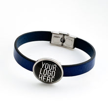 custom stainless steel logo slider charm on blue leather strap