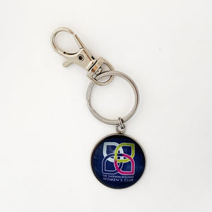 stainless steel keychain with navy blue Sherwin Williams Women's Club logo