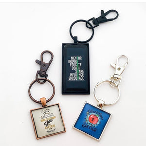 miscellaneous teacher graphic keychains in various sizes and shapes