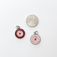 custom stainless steel PEO International charms