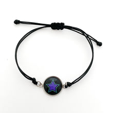 black adjustable cord friendship bracelet with purple star charm