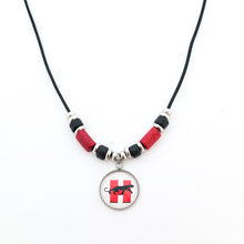 custom Hillcrest high school panthers pendant on a black leather cord with red and black greek ceramic beads